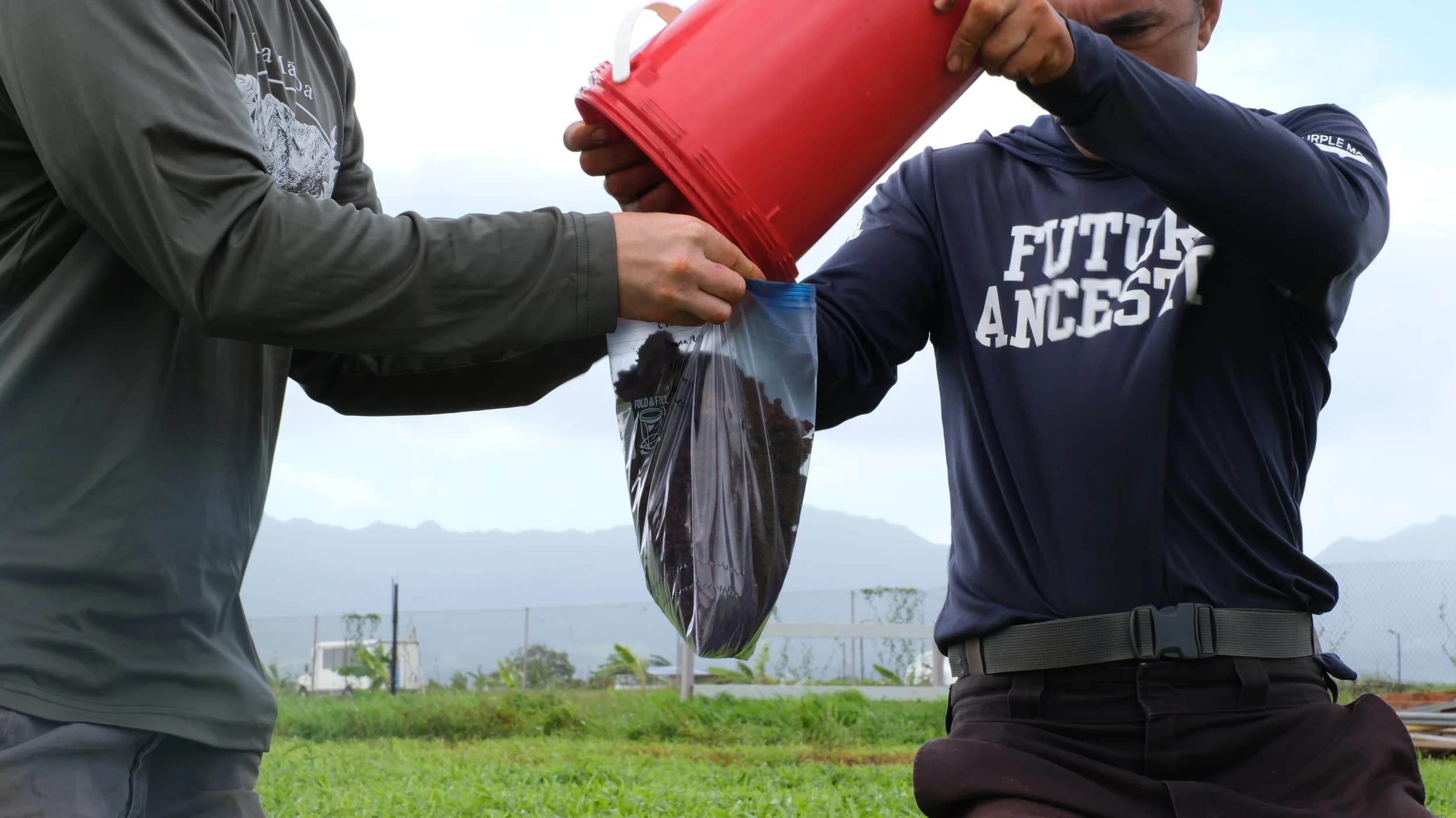 Soil sample collection in the field in Hawaiʻi